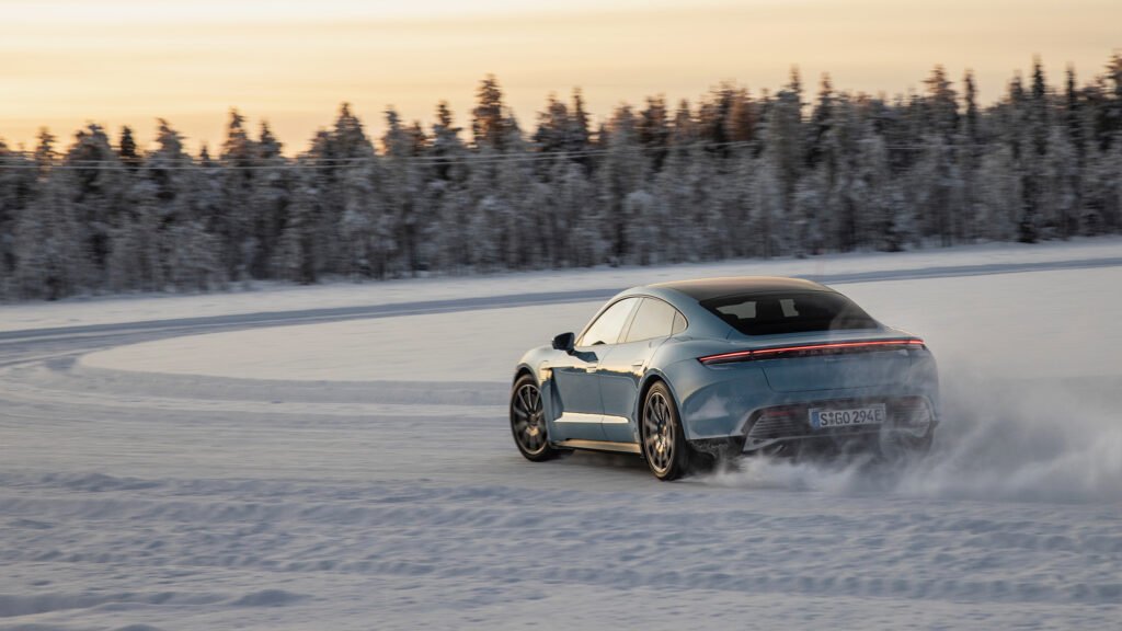 2020 Porsche Taycan 4S driving in the snow in Finland