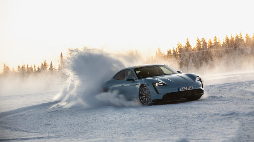 2020 Porsche Taycan 4S driving in the snow in Finland