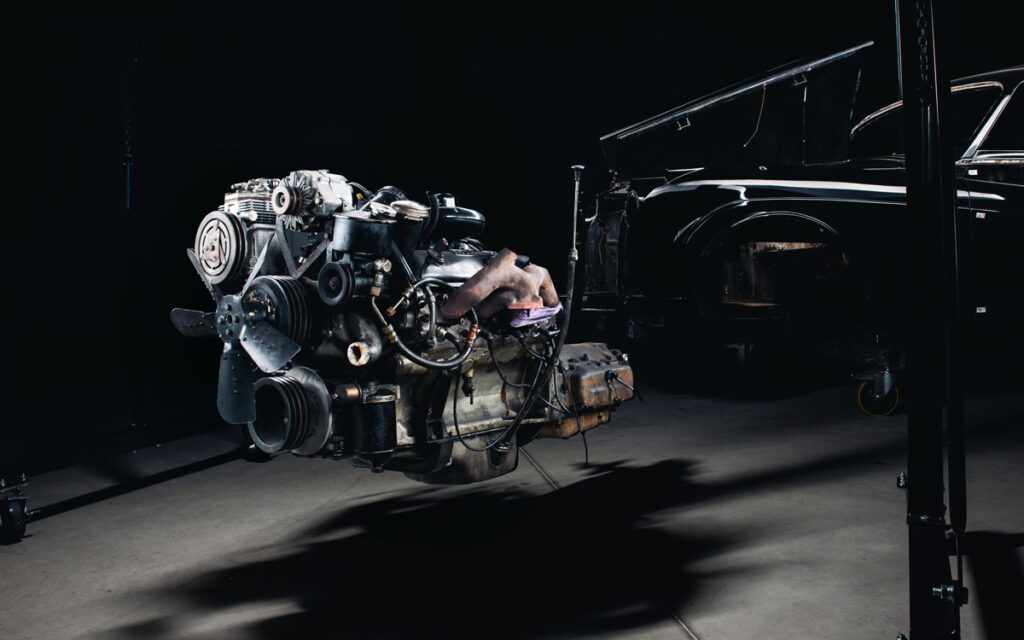 The V8 engine of a Rolls-Royce Phantom is removed to make way for electric motors and batteries