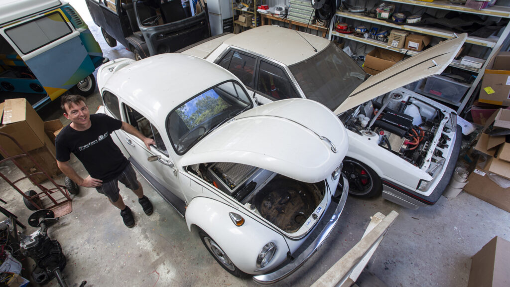 Traction EV's James Pauly with 1987 Nissan R31 Skyline and VW Beetle with electric conversions