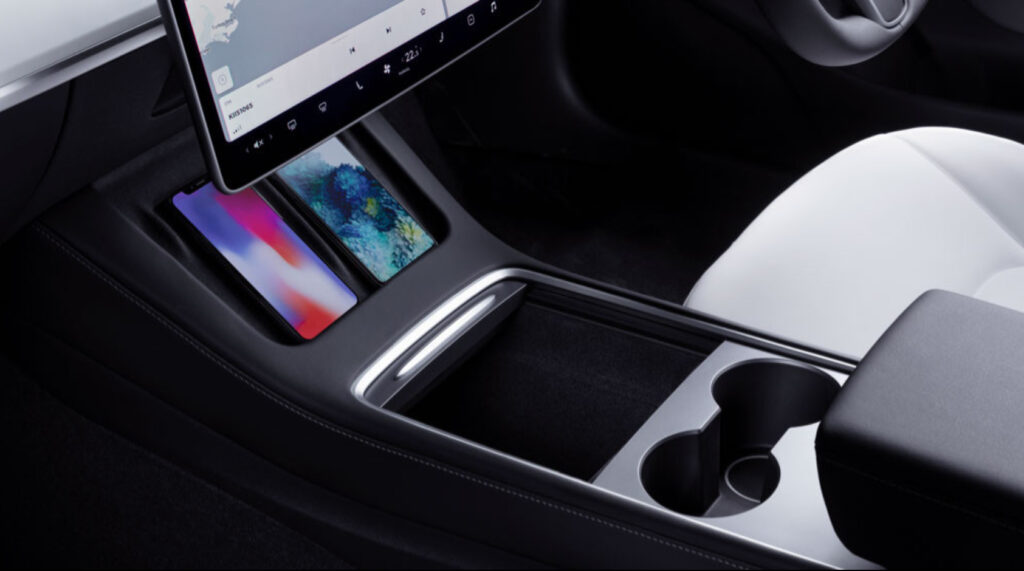 Tesla Model 3 MY21 update with revised matte black trim, new centre console, dual wireless phone chargers and magnetic closures to snap sunvisors back into place