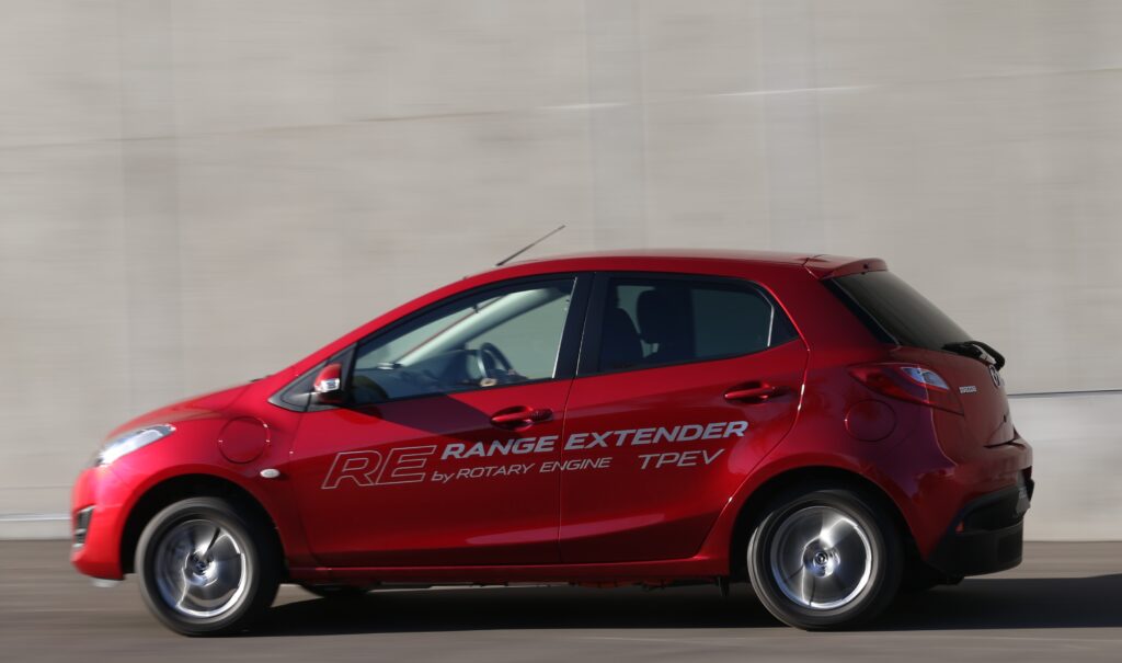 2013 Mazda 2 EV fitted with a 330cc rotary engine as a range extender to charge the batteries