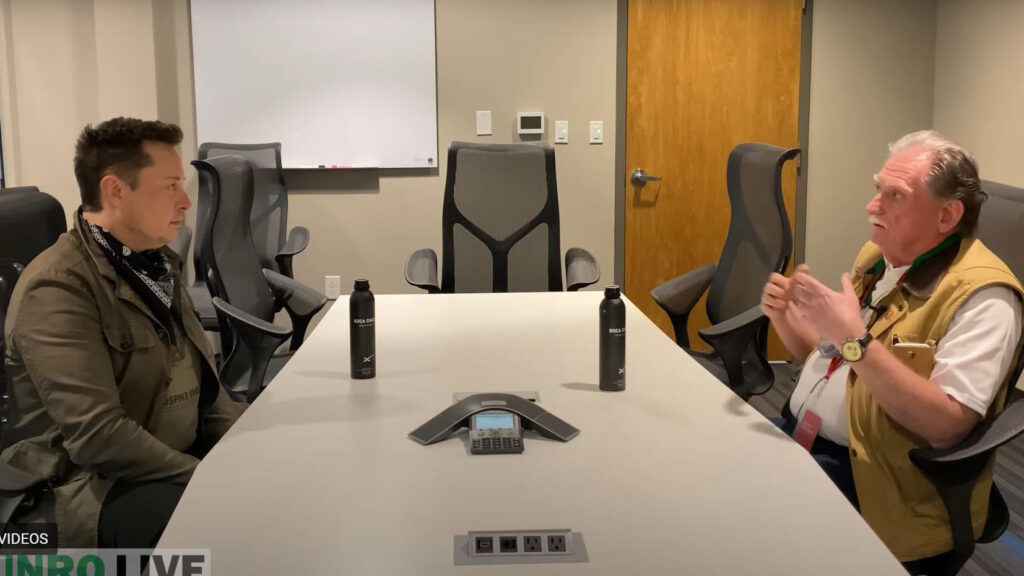 Tesla CEO Elon Musk being interviewed by automotive engineer Sandy Munro