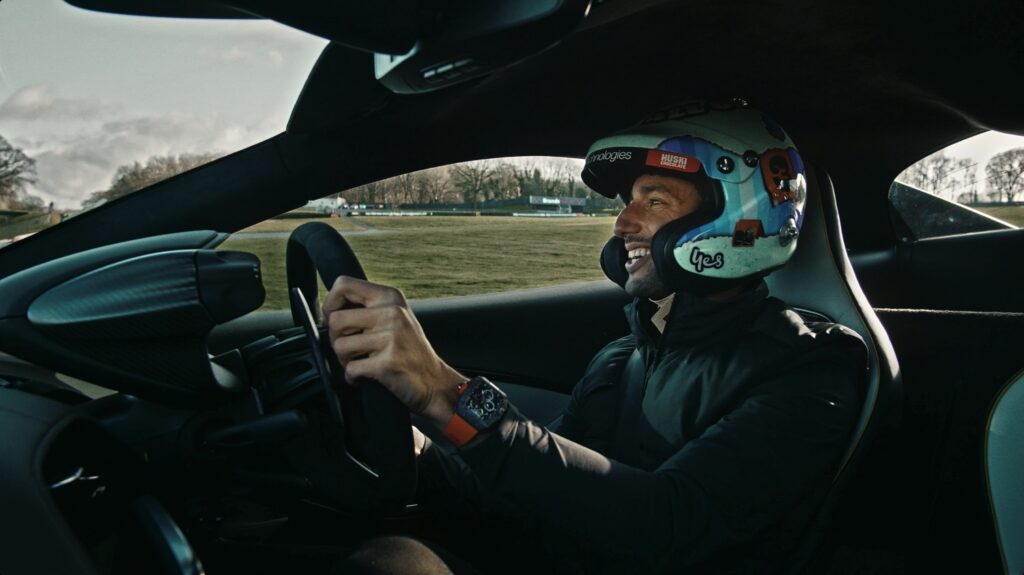 Australian F1 driver Daniel Ricciardo behind the wheel of the Artura, the first plug-in hybrid electric car from McLaren