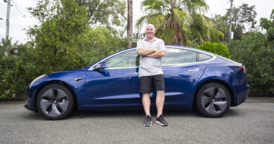 Ian Suter with his Tesla Model 3