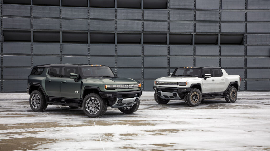 The GMC Hummer EV SUV (pictured left alongside the GMC Hummer SUT) is an all-electric off-roader set to debut in 2023