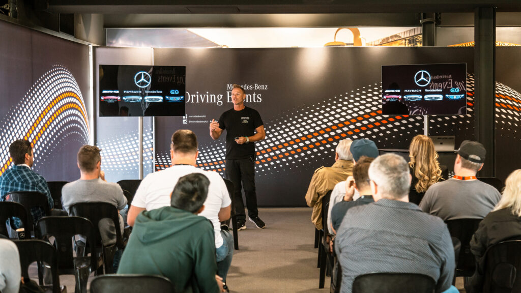 Chief instructor Peter Hackett briefing participants at a Mercedes-Benz Driving Event that now incudes the EQC electric SUV