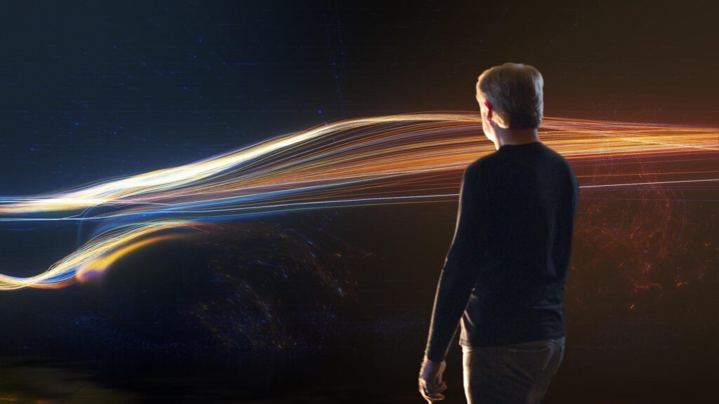 Fisker CEO Henrik Fisker with a styling sketch of the upcoming 2023 EV known for now as Project PEAR