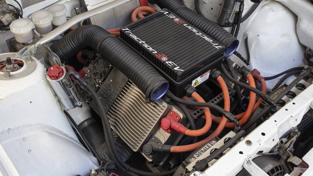 Traction EV's 1987 Nissan R31 Skyline converted to electric power. Two motor controllers are mounted at 45-degrees for a V8-style look, with the drag car using two 300kW NetGain Warp 11 DC motors