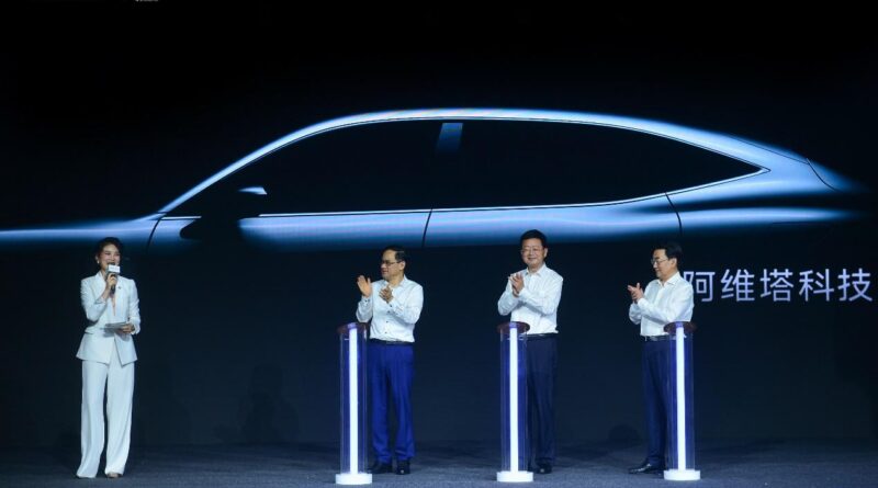 Changan Automobile executives standing in front of the silhouette of the new Avatar E11, which is due on sale by the end of 2021