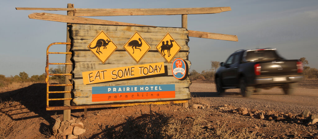 Mercedes-Benz X-Class passing a sign for the Prairie Hotel in South Australia