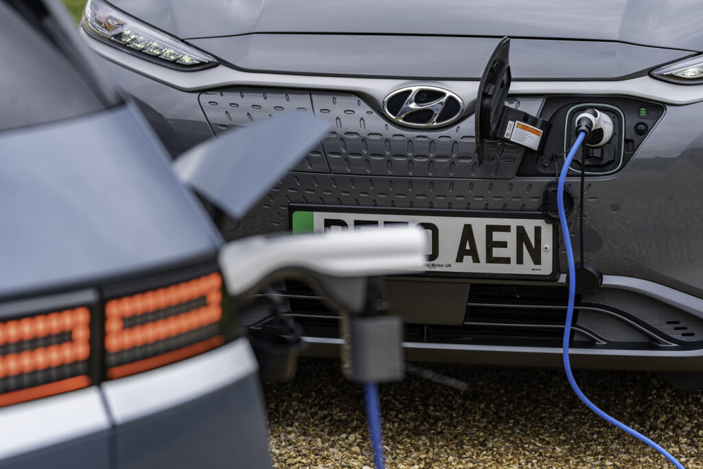 Hyundai Ioniq 5 charging a Kona Electric