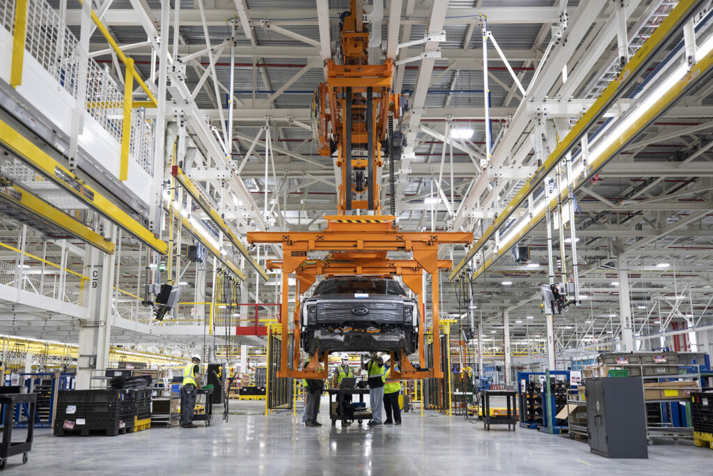 The Ford F-150 Lightning electric ute has started rolling down the production line at the Rouge Center in Dearborn, Detroit