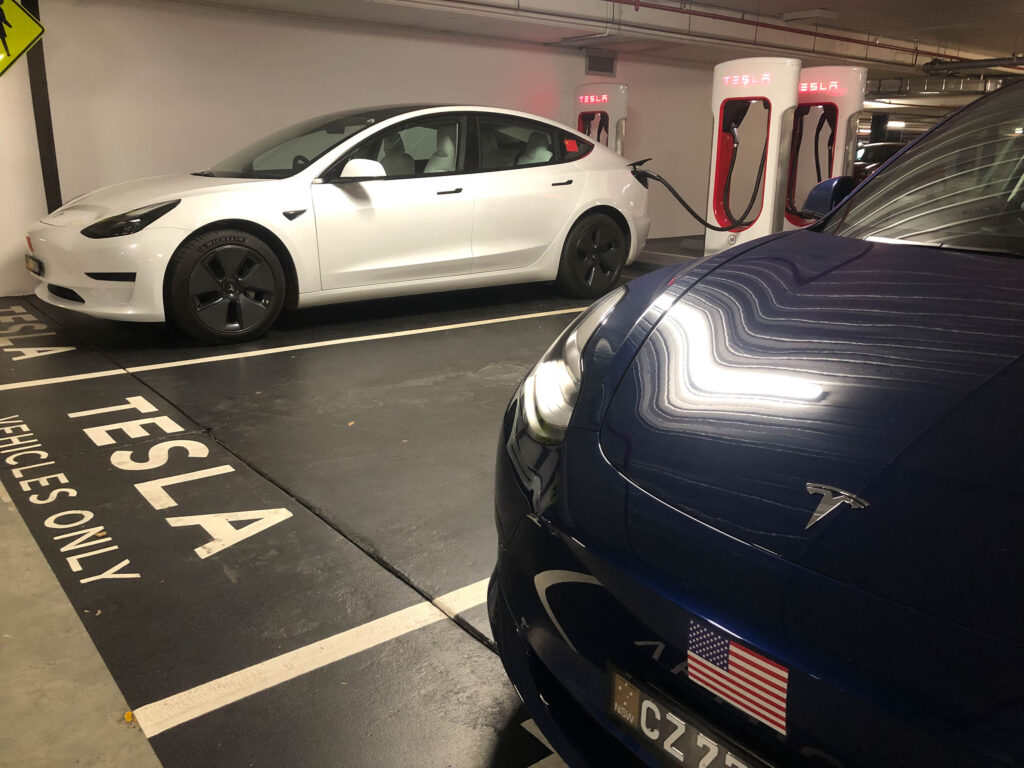 Tesla Model 3 made in America and Tesla Model 3 made in China charging
