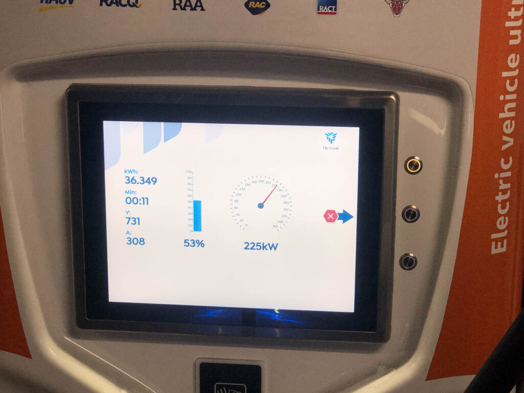 Hyundai Ioniq 5 charging at a 350kW ultra-rapid charger showing a peak power of 225kW
