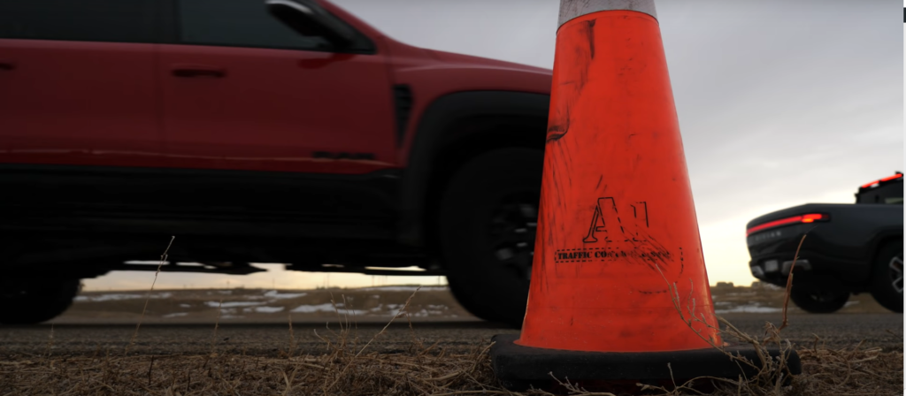Rivian R1T in a drag race with a Ram TRX conducted by The Fast Lane