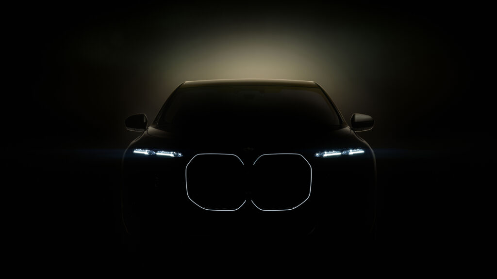 BMW i7 teaser showing the crystal headlights and illuminated kidney grille