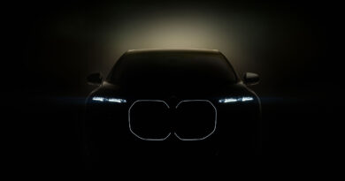 BMW i7 teaser showing the crystal headlights and illuminated kidney grille