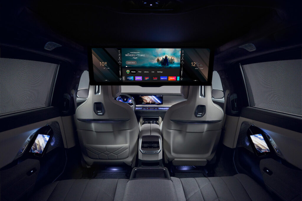 2022 BMW i7 rear seat with theatre screen.