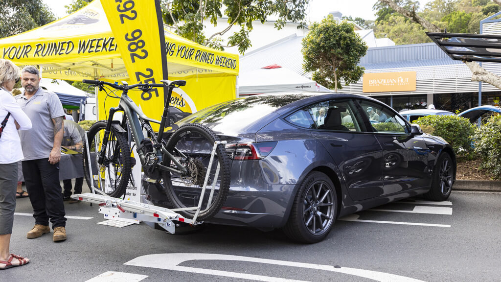 Tesla Model 3 with tow-bar mounted bike carrier