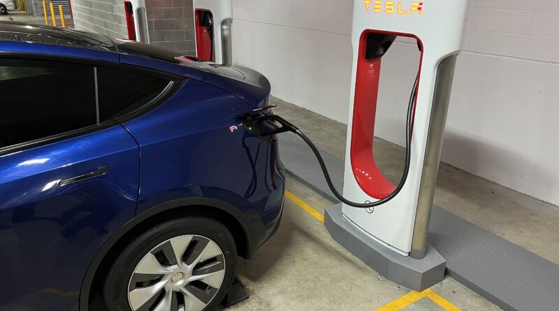Tesla Model Y charging at a V3 Supercharger at Kirrawee in Sydney