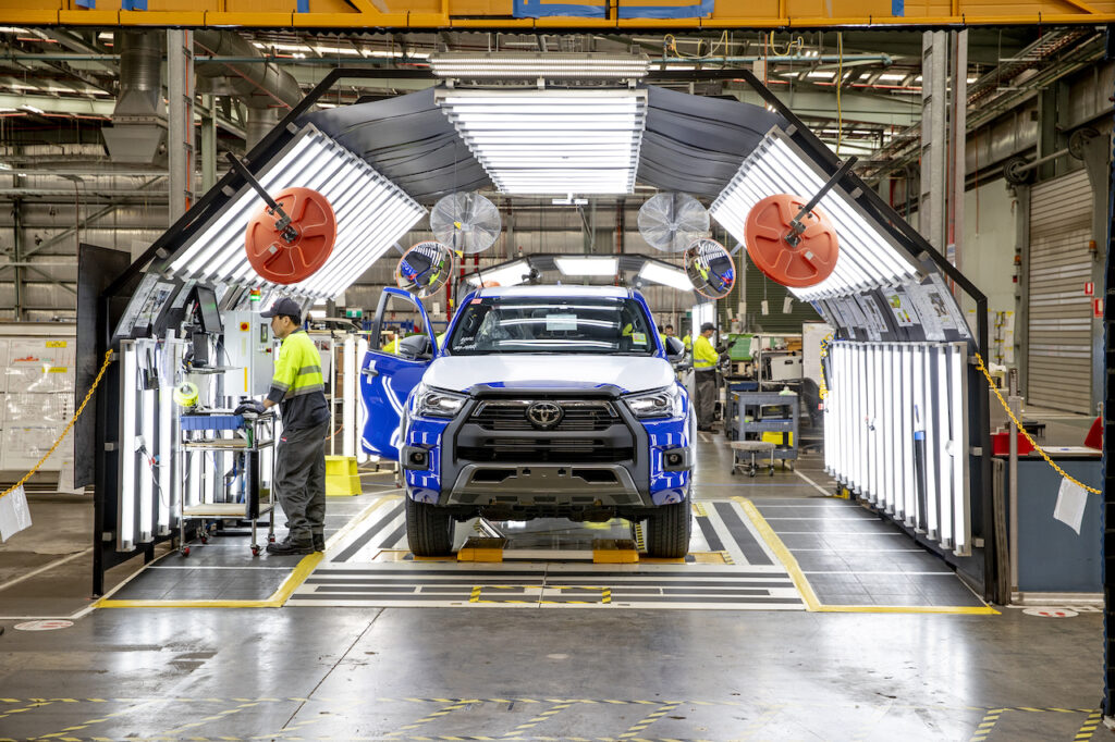 Toyota Hilux undergoes modification at a Toyota facility in Australia.