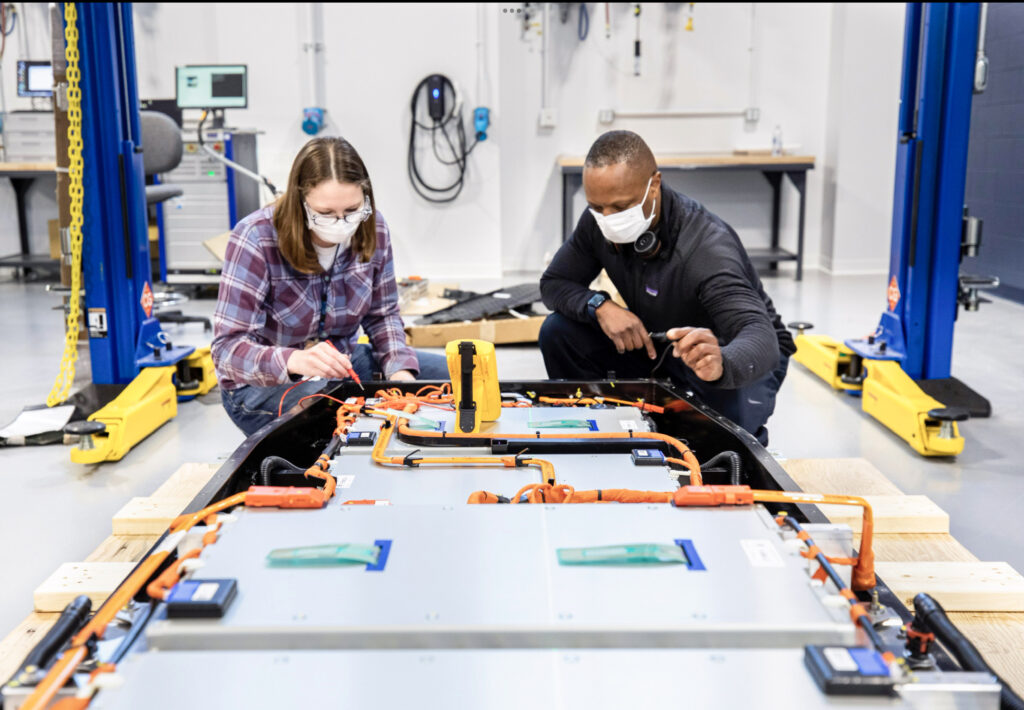 Ford engineers at the company’s Battery Benchmarking and Test Laboratory in Allen Park, Michigan