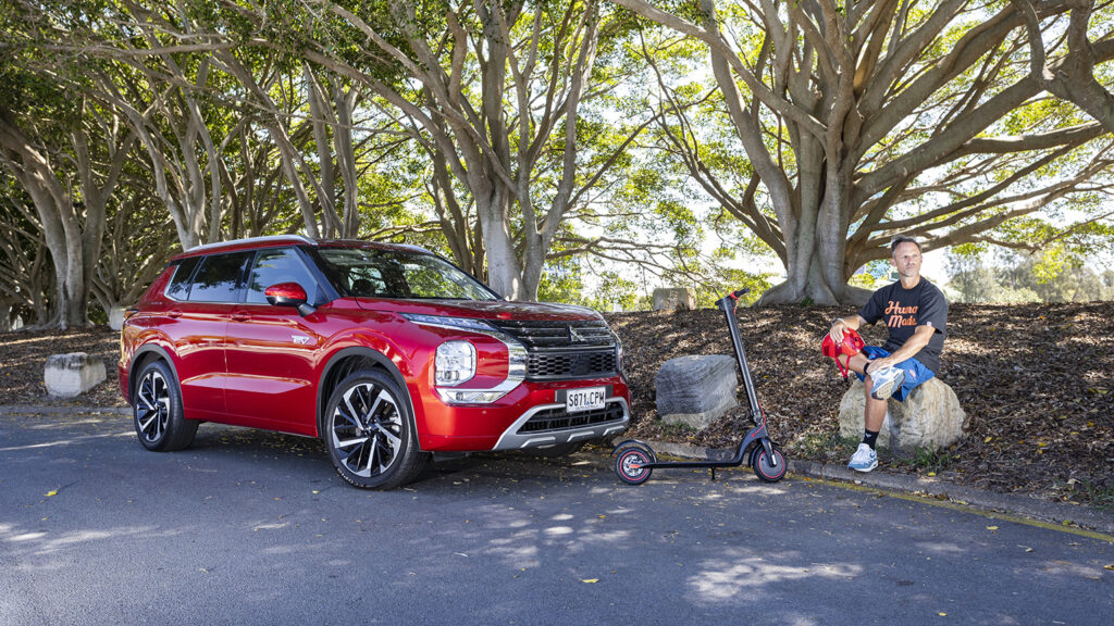 2023 Mitsubishi Outlander PHEV Exceed with electric scooter