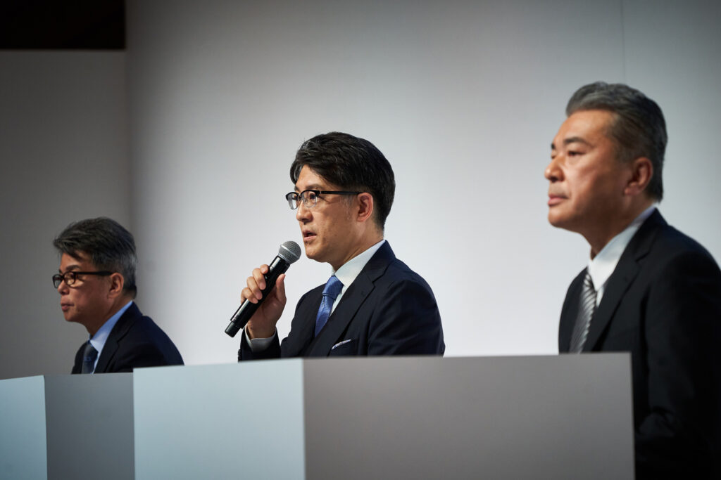 Koji Sato speaks at a Tokyo press conference on April 7 2023 announcing Toyota's ramped-up EV commitment.