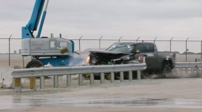 Rivian R1T pick-up being crash tested against a guardrail