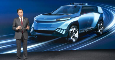 Nissan chief Makoto Uchida with Hyper Adventure concept.