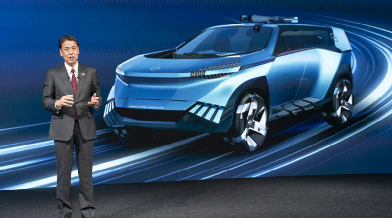 Nissan chief Makoto Uchida with Hyper Adventure concept.