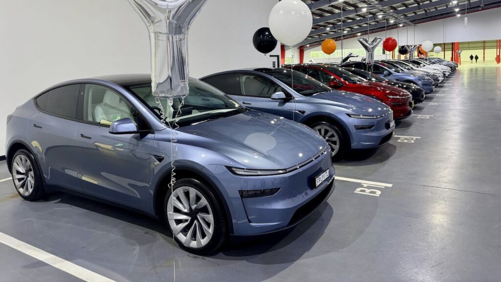 2025 Tesla Model Y Junipers lined up to be delivered.