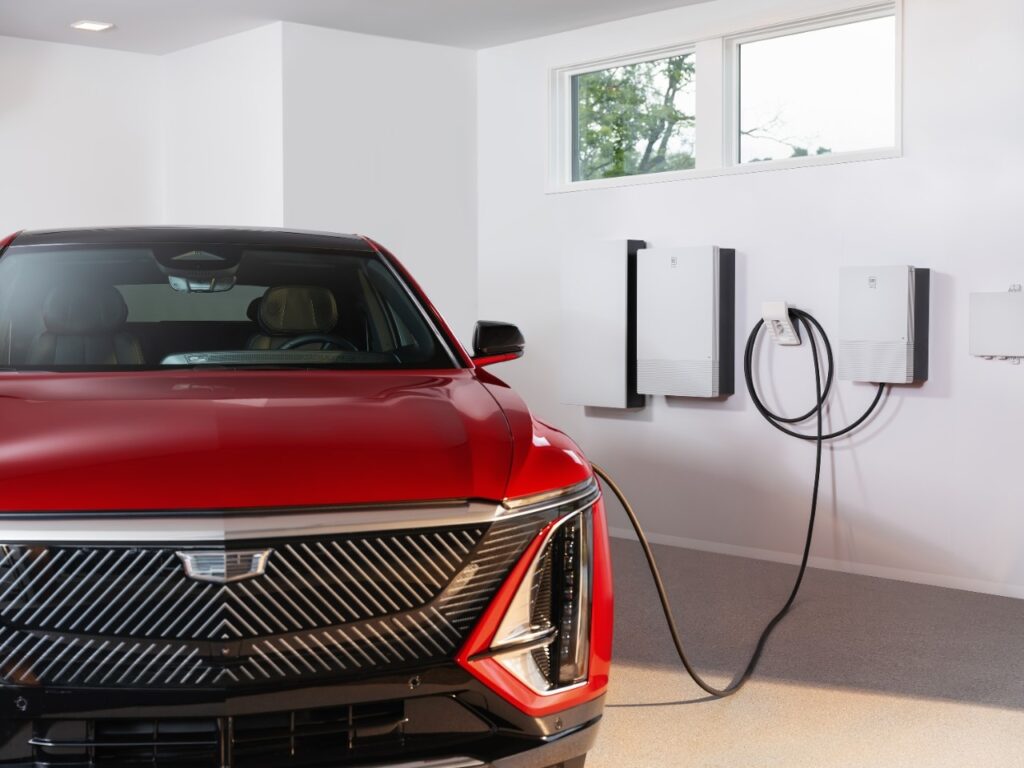 Cadillac and EV charger.