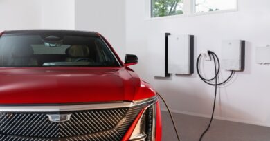 Cadillac and EV charger.