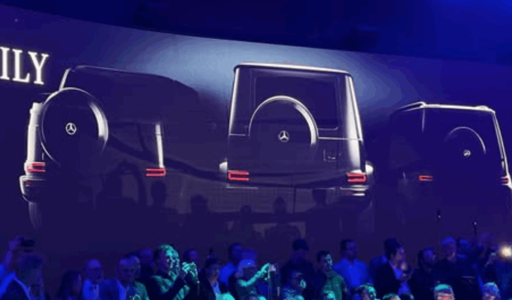 Mini G is on the right next to G-Wagen (centre) and incoming G-Cabrio during a presentation at the Munich IAA.